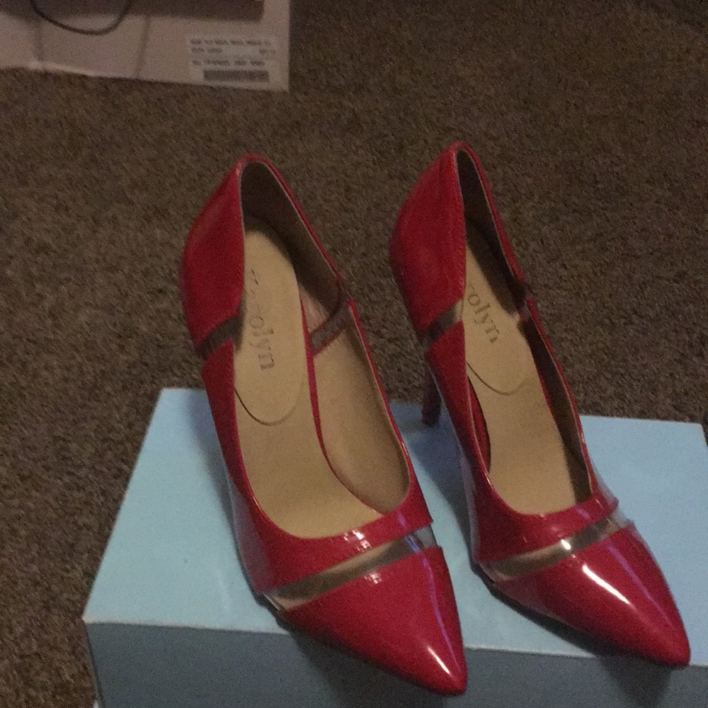 Red heel pumps